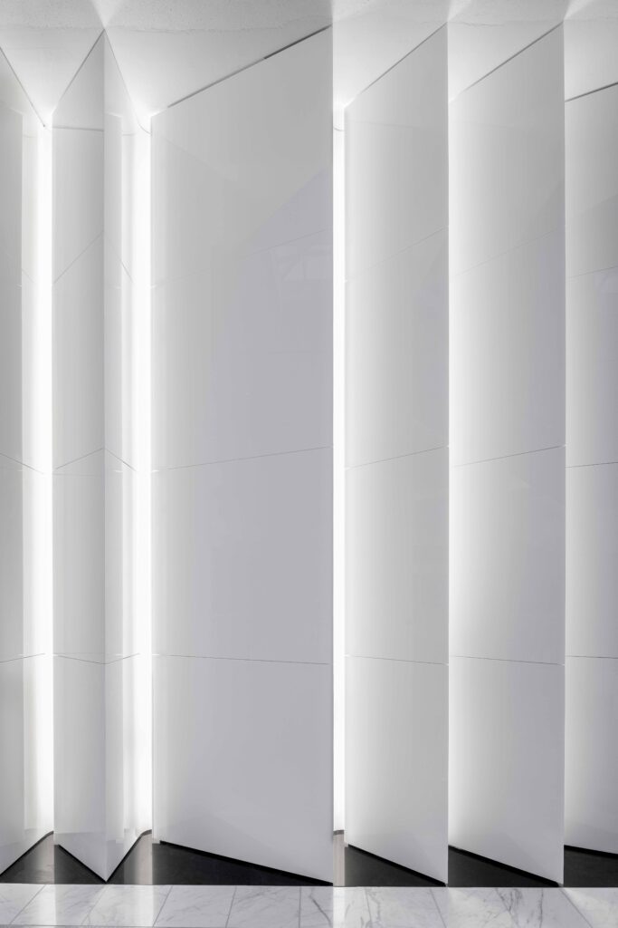 Artisan Stoneworks New York Luxury Stonework Chanel Tyson Galleria Wall Lighting