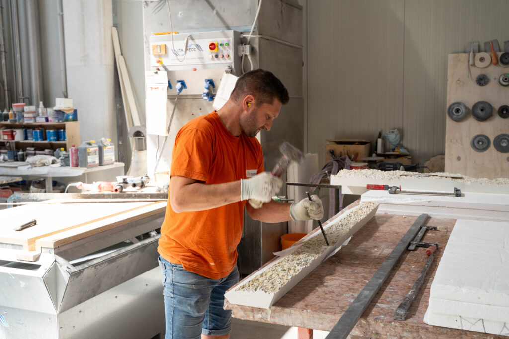 Artisan Stoneworks New York Luxury Stonework David Yurman Miami Design District Hammering Stone